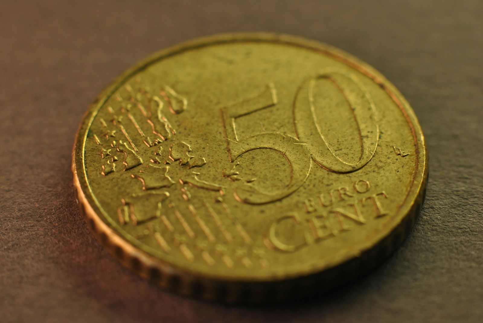 A close up of a 50 cent coin